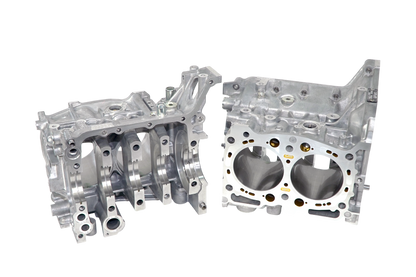 CJM Components EJ25 closed deck short block. gold ej25 inserts have coolant passages to help keep the engine cool. 750hp capable